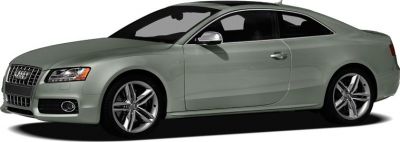 Side profile of a sporty two-door coupe with sleek design and stylish wheels