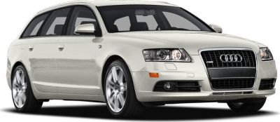 White station wagon with prominent front grille and alloy wheels