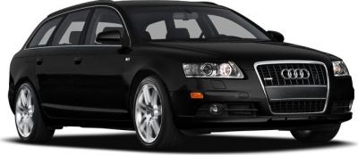 Black station wagon with modern headlights and sporty alloy wheels