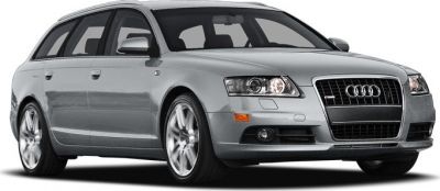 Silver station wagon front-side view with distinct grille and alloy wheels
