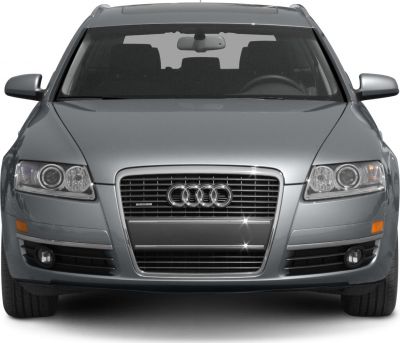Front view showing grille, headlights, fog lights, and windshield.