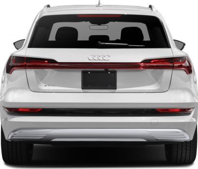 White electric SUV rear with continuous LED taillight and rear windshield wiper