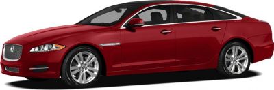 Side profile of sleek luxury sedan with alloy wheels