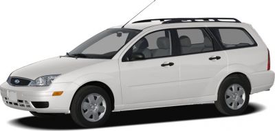 White station wagon with roof rails and steel wheels, side profile.