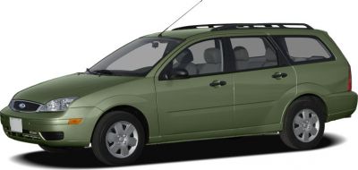 Green wagon with roof rails and distinct front headlights