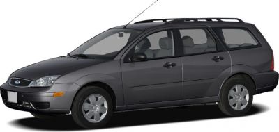 Side profile of a silver station wagon with roof rails