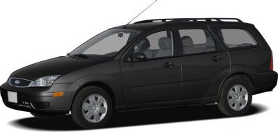 Side profile of a black station wagon with roof rails and four doors