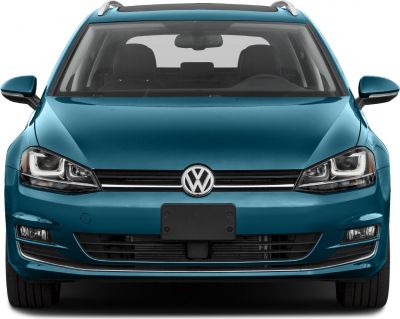 Front view showing headlights, grille, and roof rails.