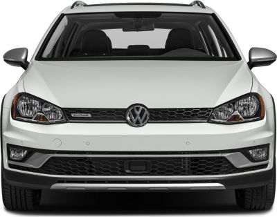 Front view of white SUV with hexagonal grille and fog lights