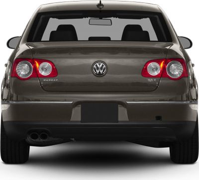 Rear view with taillights and dual exhaust of sedan