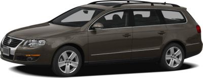 Side profile of a station wagon with roof rails and alloy wheels.