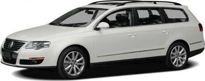 White station wagon with roof rails and alloy wheels