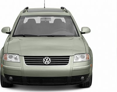 Front view with roof rails and split headlights on station wagon