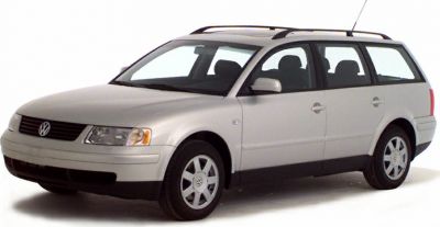 Front side view of a silver estate wagon with roof rails and alloy wheels.