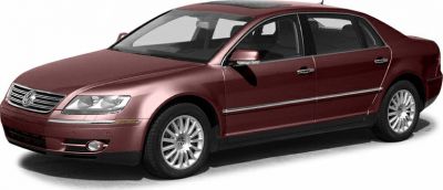 Front side view of luxury sedan with alloy wheels