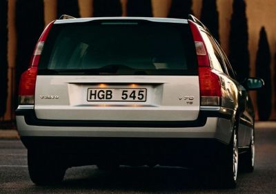 Rear view of a station wagon with vertical taillights and tailgate.