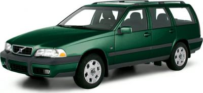 Green station wagon with roof rails and alloy wheels