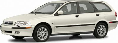 White station wagon side profile with alloy wheels