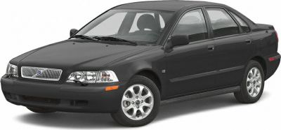 Front view of sedan with alloy wheels and classic grille