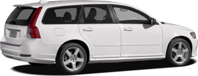 White station wagon side and rear view with 5-spoke wheels and tinted windows