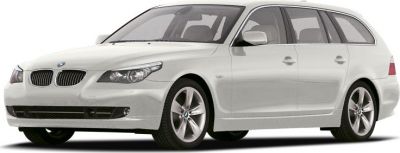 White station wagon with sleek headlights and aerodynamic body.