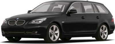 Black station wagon front-side view with alloy wheels and sleek design