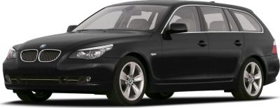 Black BMW 5 Series Touring F11 wagon with alloy wheels and kidney grille