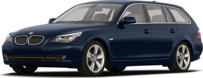 Side front view of a sleek estate wagon with alloy wheels and kidney grille