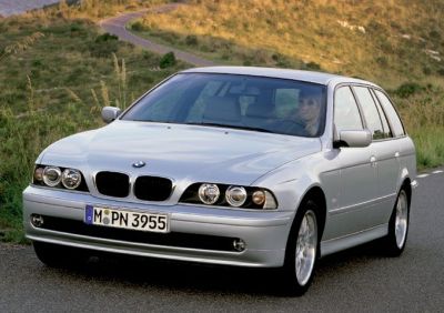 Silver wagon with quad headlights and sleek design