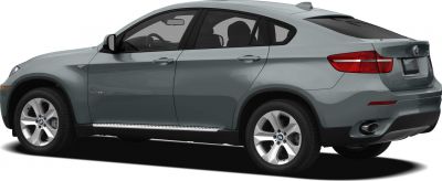Side profile and rear of a sleek coupe-like SUV with alloy wheels and rear exhaust