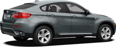 Side and rear view of SUV with sloping roofline and alloy wheels
