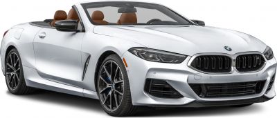 Front side view of luxury convertible with distinctive headlights and grille.