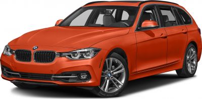 Front angle view showing grille, headlights, and alloy wheels