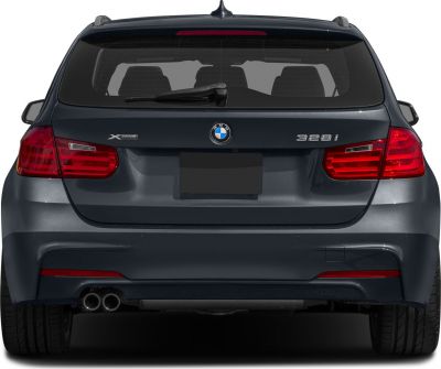 Rear hatchback with dual exhaust, xDrive badge, and roof rails