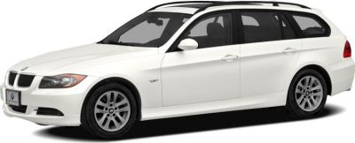 White mid-2000s station wagon with roof rails and five-door layout