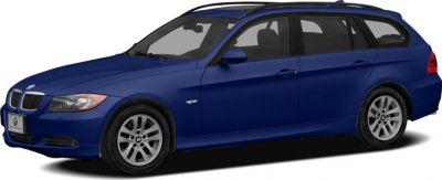 Blue station wagon side profile with alloy wheels and long roofline.