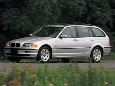 Silver station wagon with dynamic stance and classic wagon design
