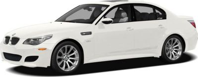 White luxury sports sedan with alloy wheels, front-side angle