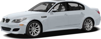 White sports sedan with alloy wheels and aerodynamic design