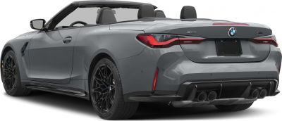 Rear and side view of a sporty convertible with quad exhaust and aerodynamic design