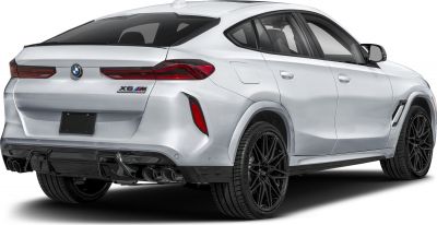 Rear and side view of SUV with quad exhausts and black alloy wheels