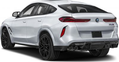 Sporty rear design with quad exhaust and sleek tail lights