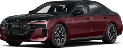 Bold front grille and stylish alloy wheels on a two-tone luxury sedan