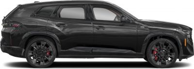 Side profile of a black SUV with large black wheels and sharp body lines