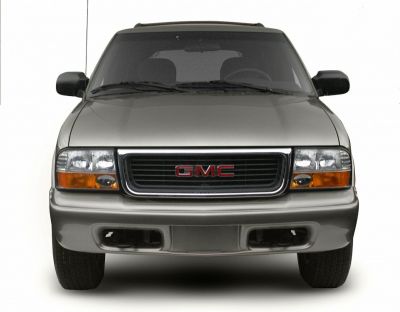 Front view featuring grille and headlights of a mid-90s SUV