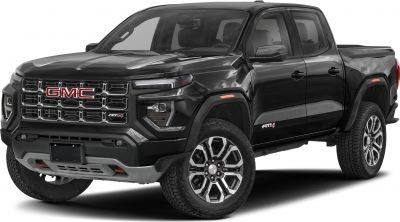 Front and side view of a rugged pickup truck with bold grille and alloy wheels