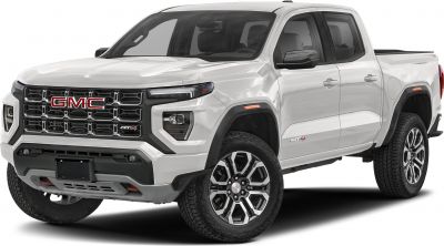 Bold front grille and rugged wheels of a modern pickup truck