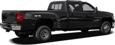 Heavy-duty long box pickup with dual rear wheels and 4x4 drivetrain