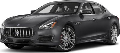 Luxury sedan front with vertical grille and multi-spoke alloy wheels