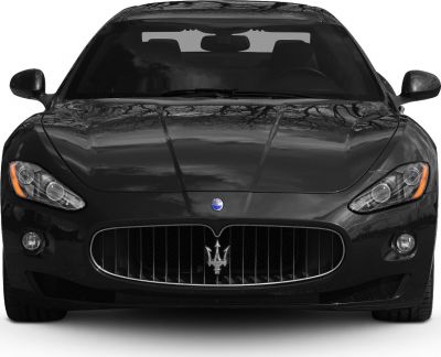 Front view with prominent grille and sleek headlights
